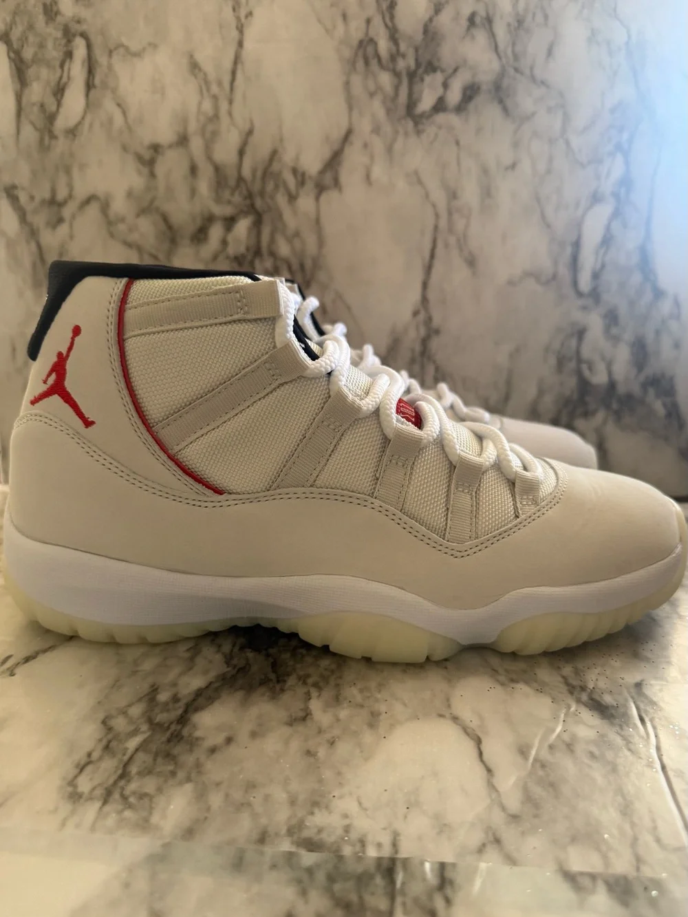NEW Air Jordan 11 Retro in Platinum Tint and University Red